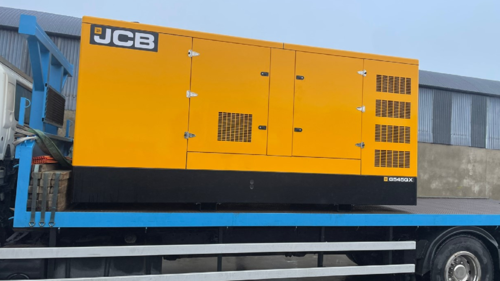 JCB G545QX Generator loaded on a truck ready for delivery