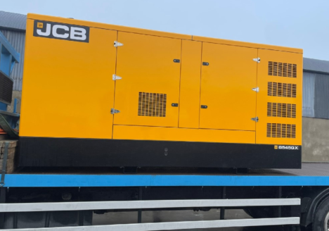 JCB G545QX Generator loaded on a truck ready for delivery
