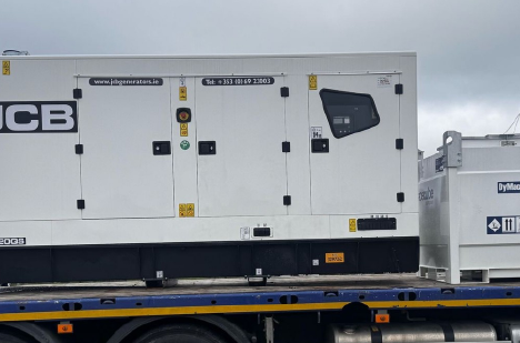 JCB generator and steel fuel tank loaded on truck